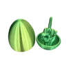 A green velvet easter egg shaped like a hand making the middle finger gesture