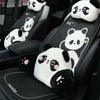 Black car seat headrest featuring panda plush toys for comfort and support.