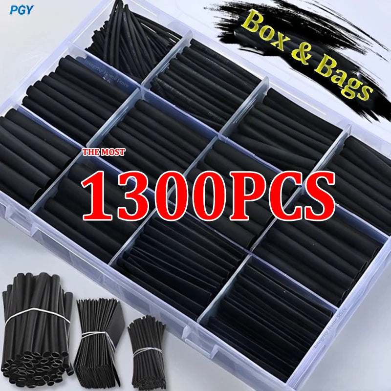 A box of 1300 pieces of black heat shrink tubing for wire protection, including various sizes and packaging bags.