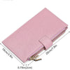 A pink RFID blocking extra-large bifold wallet with a double zipper security feature.