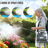A woman sprays flowers in a garden using a 2 gallon battery-powered sprayer with three modes of spray force.