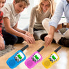 Three walkie talkie sets in blue, pink, and yellow are displayed on a wooden table with children nearby.