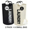 Two black laundry hampers with hanging rods and a small yellow bag