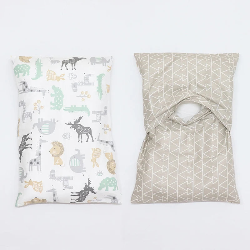 Two soft cotton baby pillowcases featuring various cartoon animal designs in pastel colors.