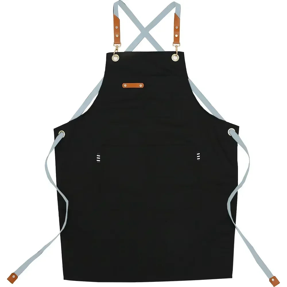 Black adjustable cotton canvas apron with straps and pockets for kitchen or salon use