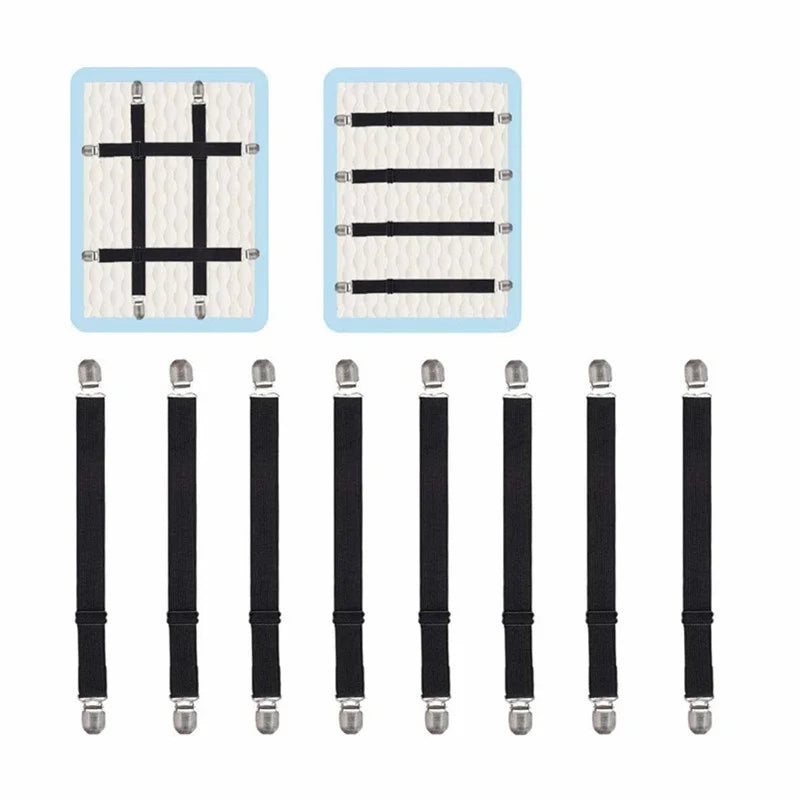 A set of four adjustable elastic bed sheet corner straps with black and white patterns.