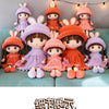 A collection of nine soft and cuddly plush dolls dressed as rabbits in various colors including pink purple orange and peach.