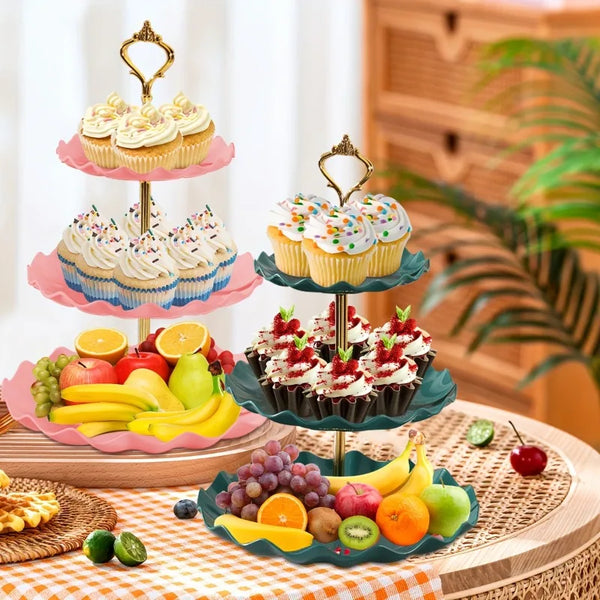 A three-tier stand displaying various cupcakes and pastries on a wooden table.