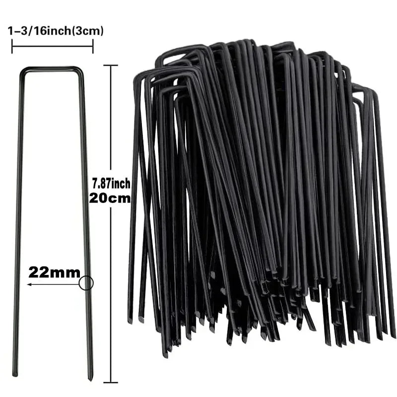 A bundle of black galvanized U-shaped garden staples for landscape fabric and netting.