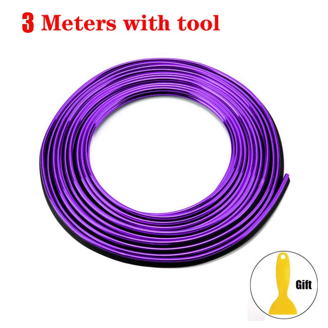 Purple flexible car interior trim strips coiled with a tool.