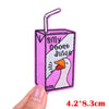 Pink embroidered iron-on patch featuring a cartoon goose face and text