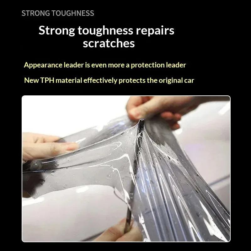 Hands are applying a clear tint film to a car's headlight or taillight to repair scratches.