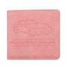 A pink leather document holder embossed with the text Registration & Insurance.