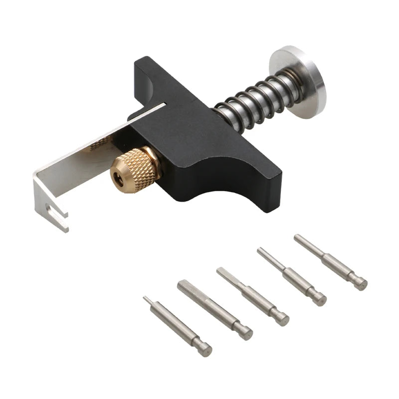 A black tool kit for removing tiny Whoop propellers, featuring a main body and an ejector pin.
