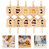 Wooden spinning tops for Hanukkah and kids' play featuring various Hebrew letters