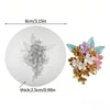 A white silicone mold shaped like a lotus flower for resin and craft projects.