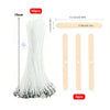 A set of 50 natural cotton candle wicks with metal stands, including a measuring stick and three individual wicks.