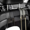 Black car headrest hooks designed to secure bags and shopping organizers