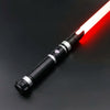 A black lightsaber with a red glowing blade is shown diagonally on a dark surface.