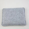 A square, gray felt mat used for wool crafting.