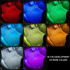 A grid showing various colors of RGB LED ambient light illuminating the interior of a car.