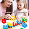 A parent and child interact with a colorful geometric stacking blocks set on a table.