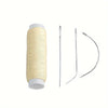 Spool of beige nylon hair weaving thread with a matching needle for extensions and wigs