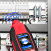 A hand holds a red underground cable and wire tracer device for locating fuses and sockets in an electrical panel.