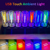 A row of USB touch ambient lights showing various colors including white, pink, blue, and purple glows.