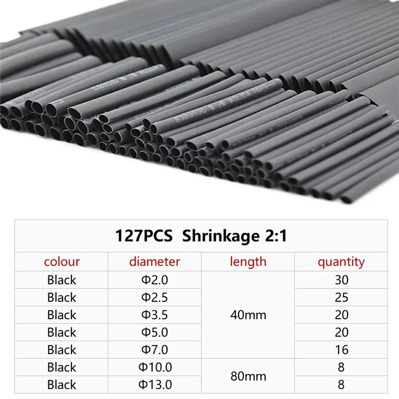 A collection of black heat shrink tubing of various diameters and lengths is shown in a close-up view.
