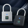 A silver and black fingerprint padlock with a keyhole and a fingerprint scanner is shown against a dark background.
