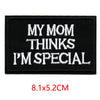 Black embroidered iron-on letter patch with white text that reads My Mom thinks I'm special