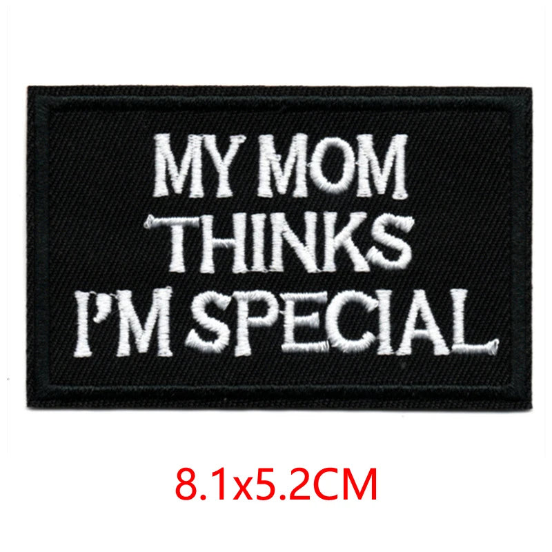 Black embroidered iron-on letter patch with white text that reads My Mom thinks I'm special