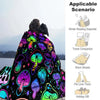 A colorful mushroom print flannel throw blanket is displayed against a snowy mountain background.