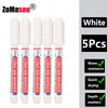 Five white long marker tools used for deep hole marking in woodworking and construction