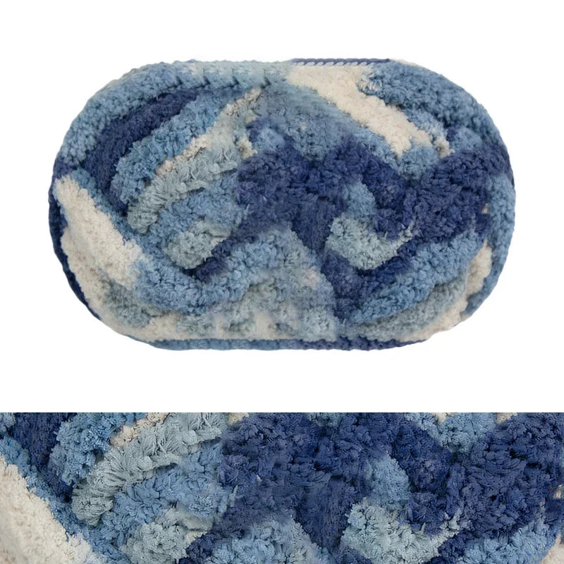 A round piece of blue and white chunky chenille yarn for hand knitting and crochet