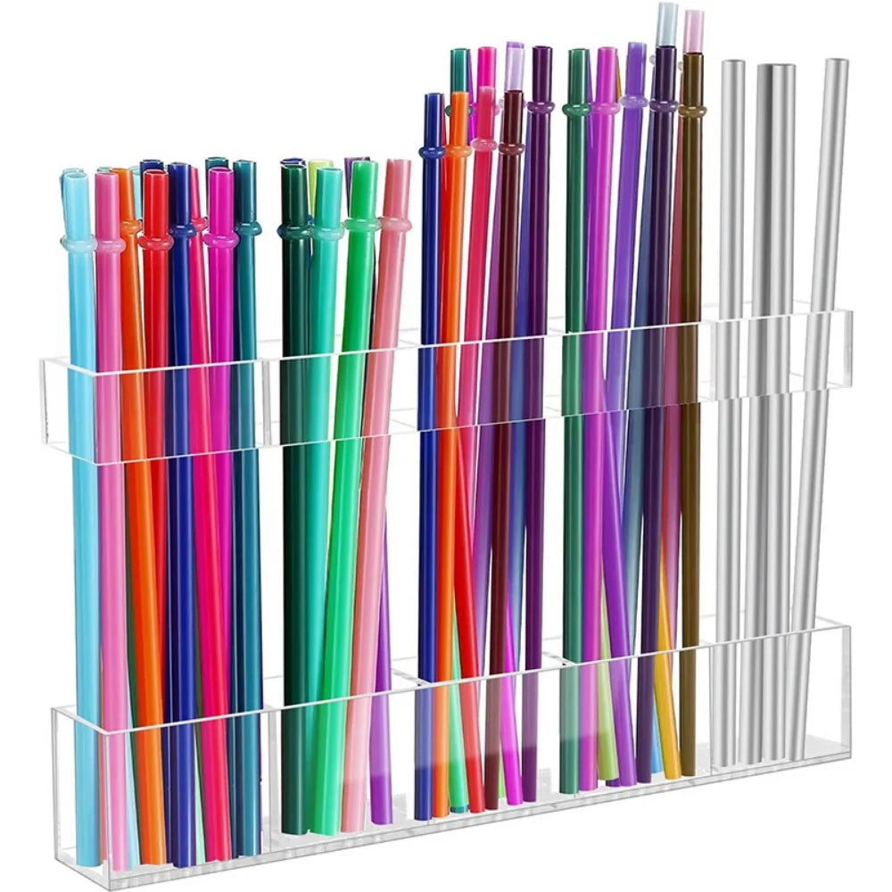 Acrylic wall-mounted holder displaying various colored straws and utensils.