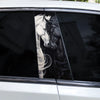 Black and white decal of a horse's head on a car window.