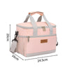 A pink insulated lunch bag with gray accents and a handle, shown in a flat lay view.