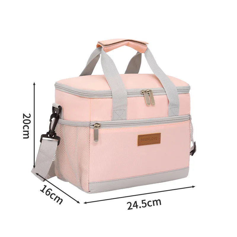 A pink insulated lunch bag with gray accents and a handle, shown in a flat lay view.
