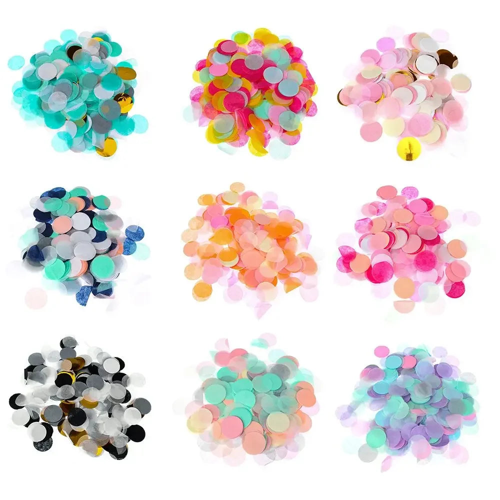 Eine Sammlung von bunten Papierschnipseln in verschiedenen Schattierungen, darunter rosa, gelb, grün und silber.