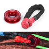 A set of a red recovery ring and black synthetic winch rope with a protective sleeve.