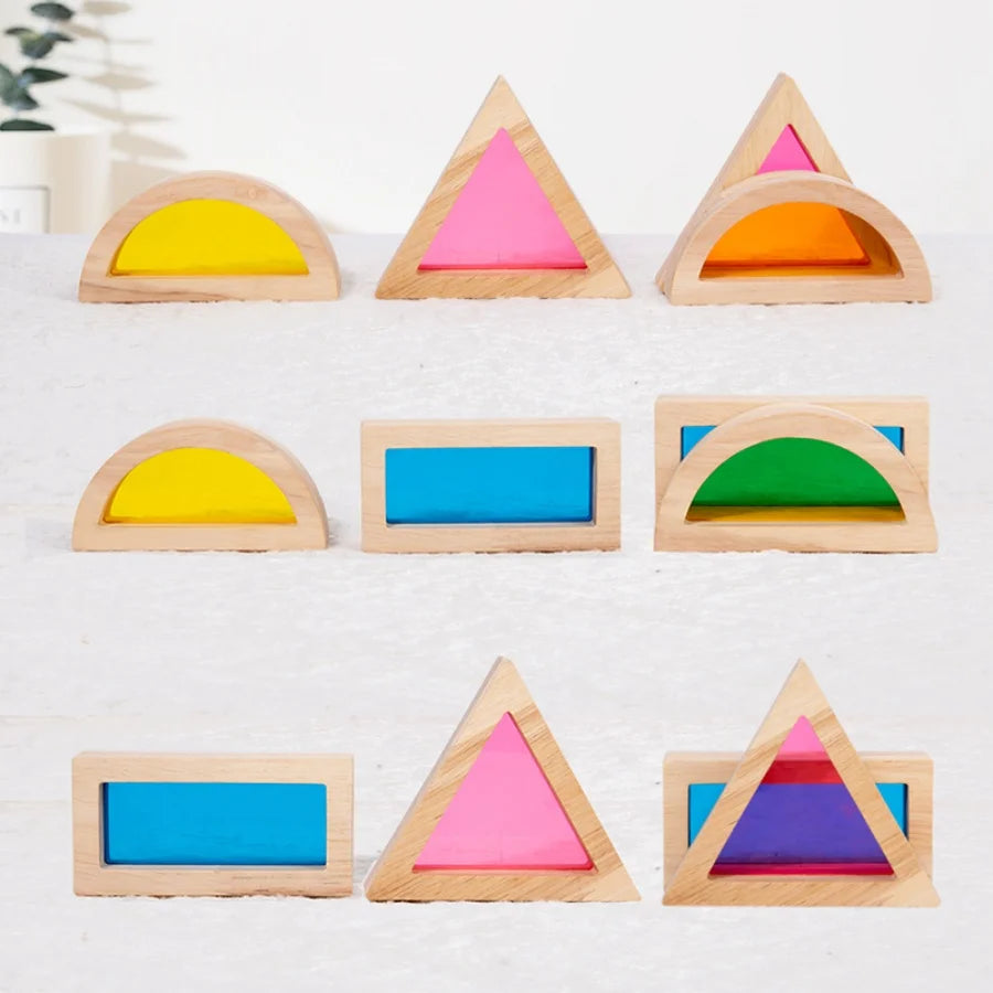 Set of rainbow wooden acrylic building blocks shaped like triangles and arches in various colors