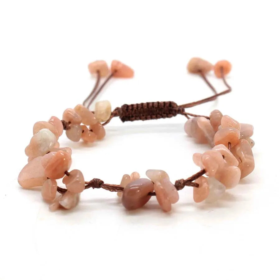 A set of natural quartz crystal chip stone braided bracelets made with macrame knots.