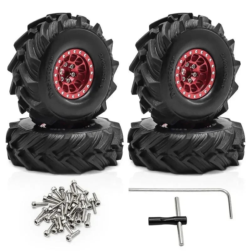 Set of four black metal beadlock wheels with tires and mounting hardware for an RC crawler