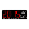 Black digital wall clock displaying the time 20:15 and a temperature of 26 degrees Celsius.