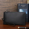 Elegant PU Leather Clutch with Dual Compartments and Wristlet Strap