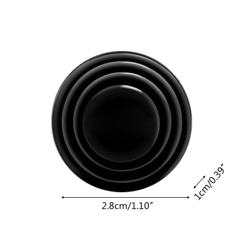 A black car door shock absorbing gasket with concentric rings shown from above.