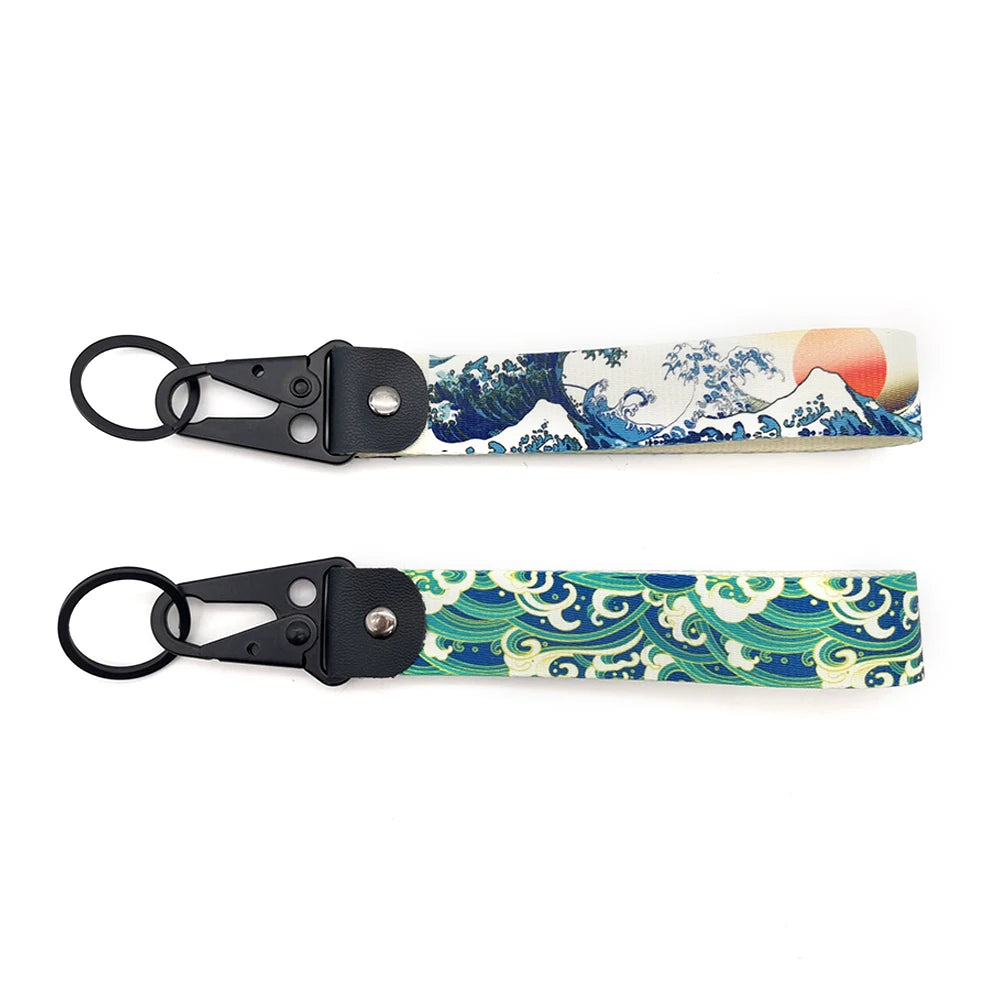 Hokkaido Wave JDM keychain featuring a Kanagawa surf design on a leather strap.