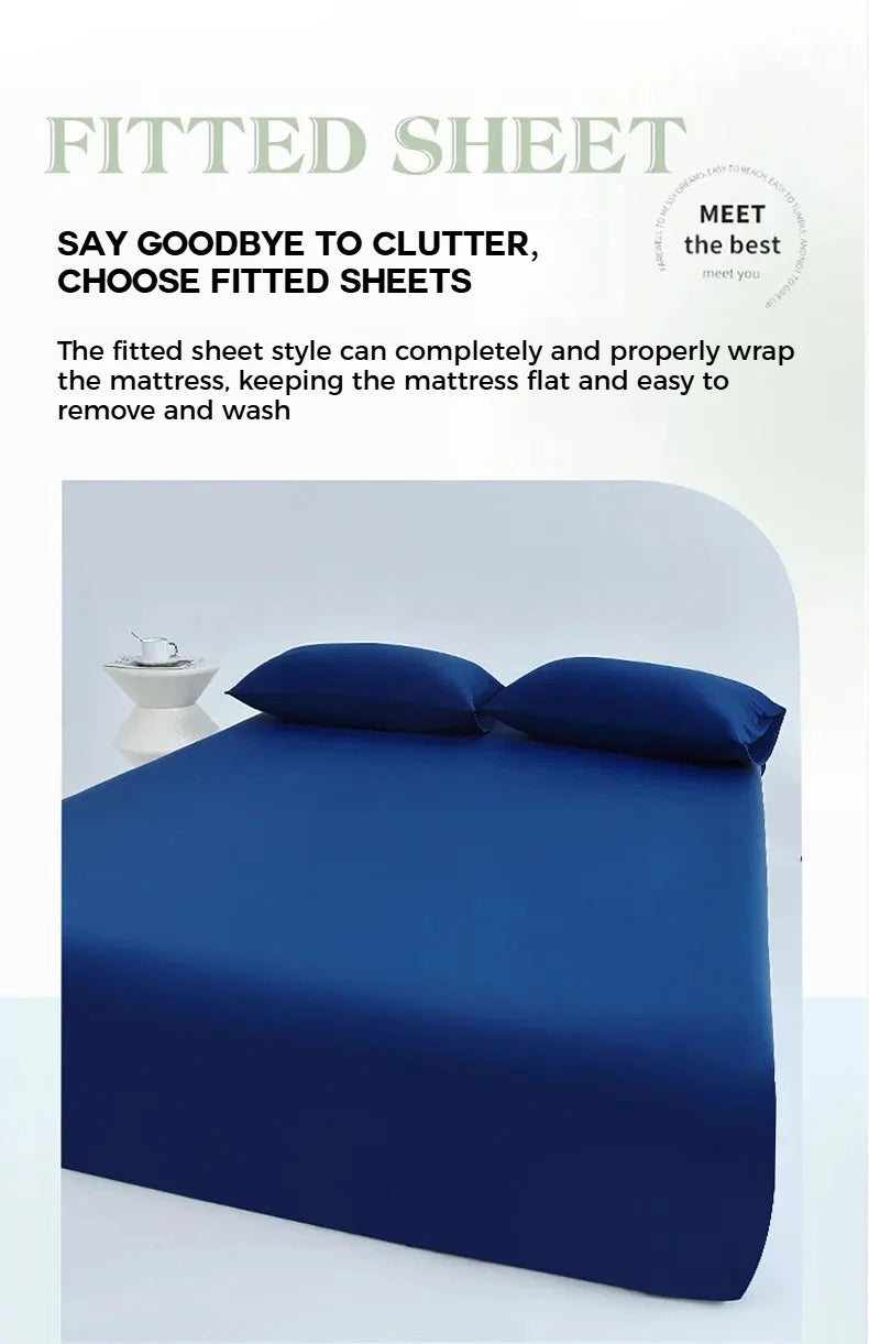 A deep blue fitted sheet is shown on a mattress, demonstrating the tight fit and smooth fabric.